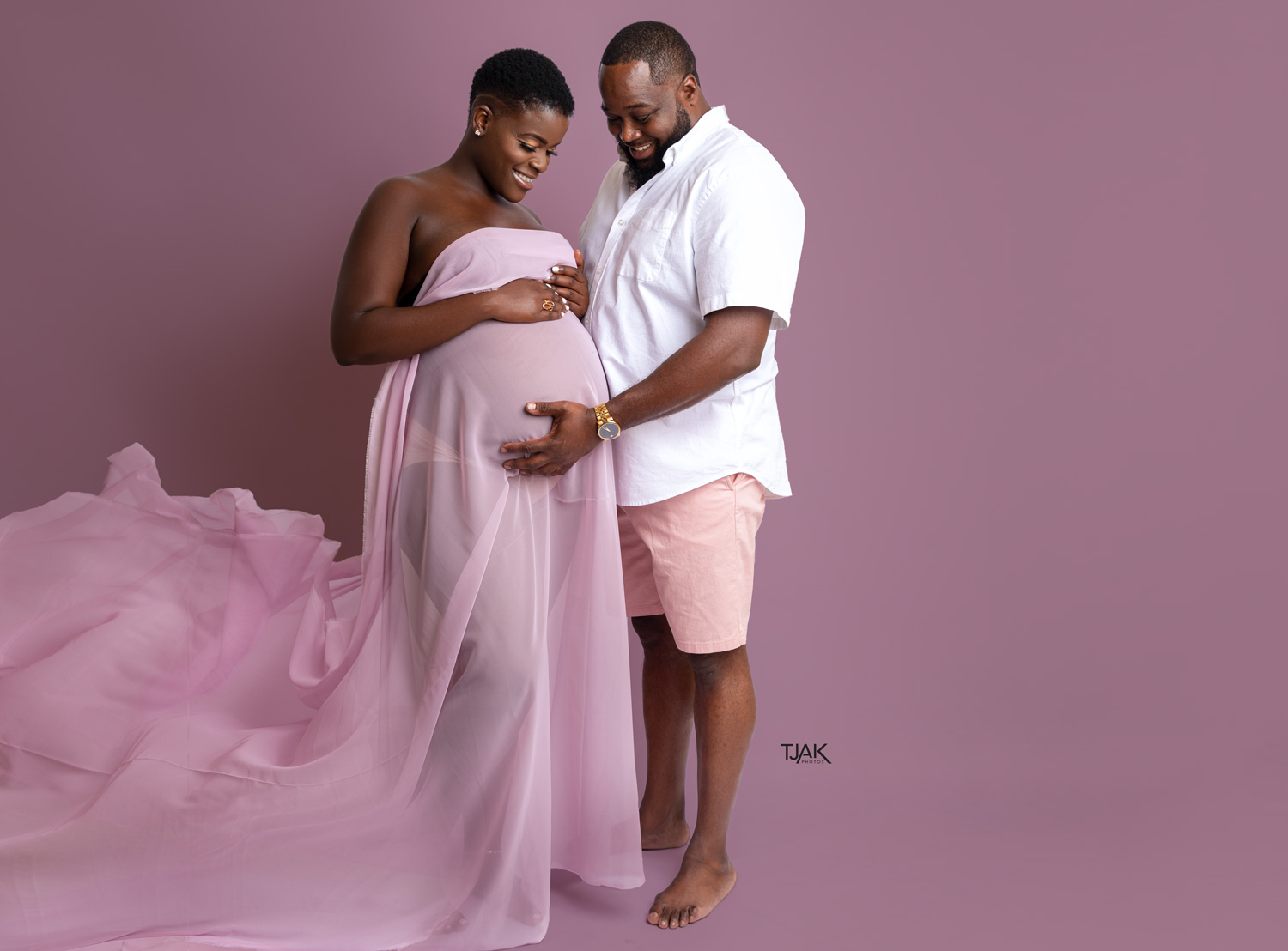 flying wrap maternity dress with a husband in a studio near Baltimore Maryland