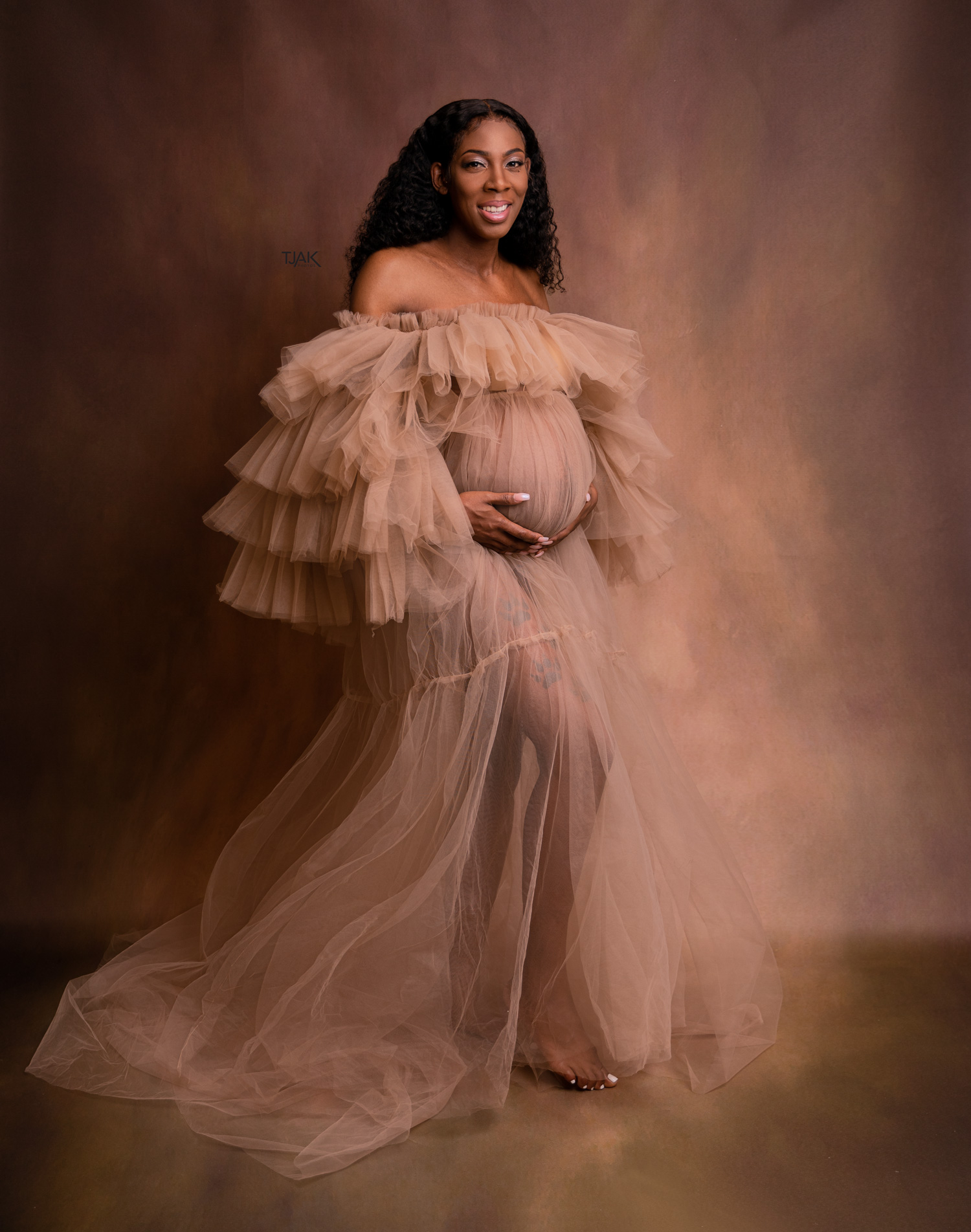 studio maternity photograph of a pregnant woman in Laurel Maryland near Baltimore MD