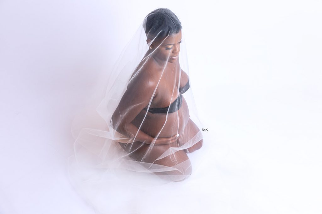 Maternity and Newborn Photography blog of a pregnant woman in a fine art maternity in a studio in Laurel MD near Savage MD